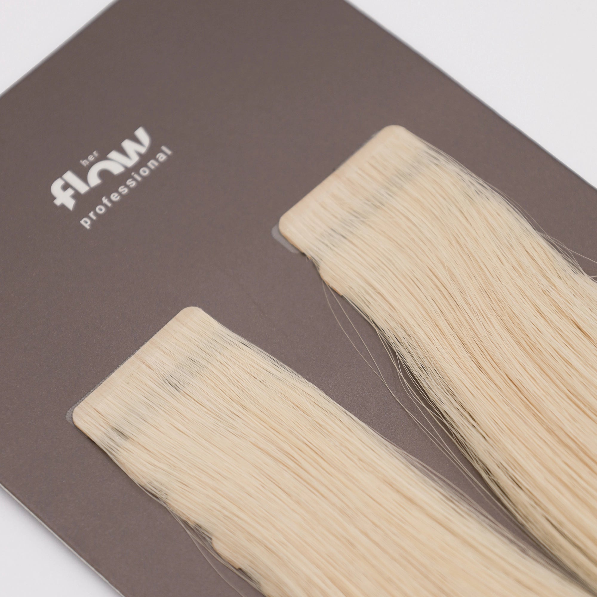Tape-in human hair extensions Pro Tape 3 cm - platinum